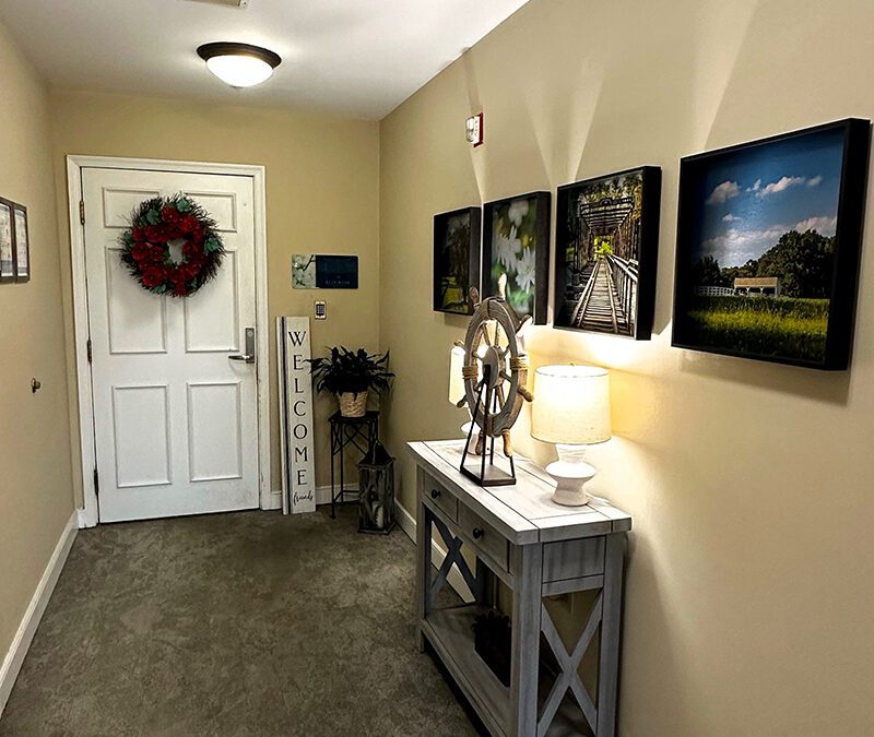 warm hallway with framed artwork
