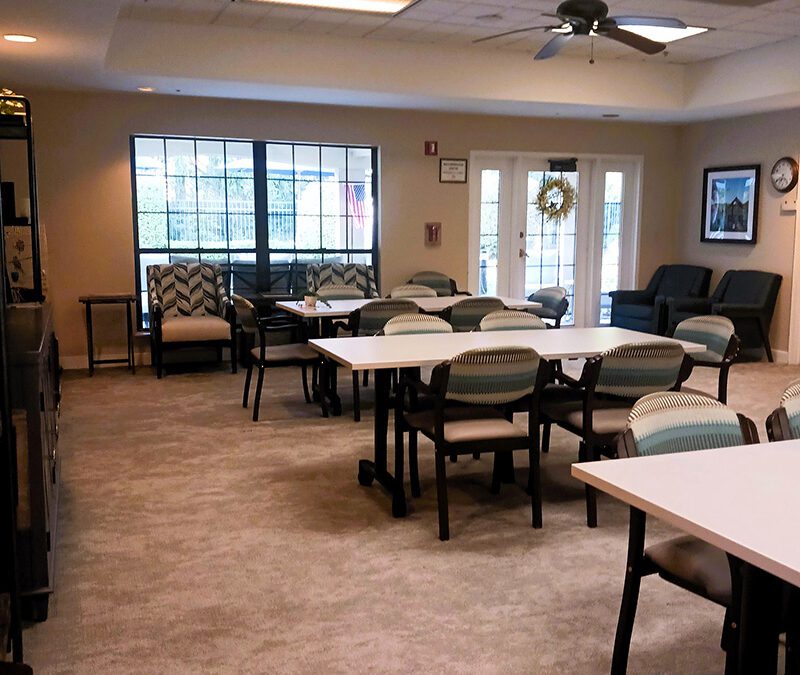 warm community room with tables and seating