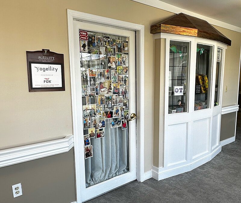 glass door display with photo collage